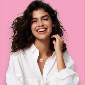 Avon "Love" Pink Mother-of-Pearl Goldtone Pendant Necklace